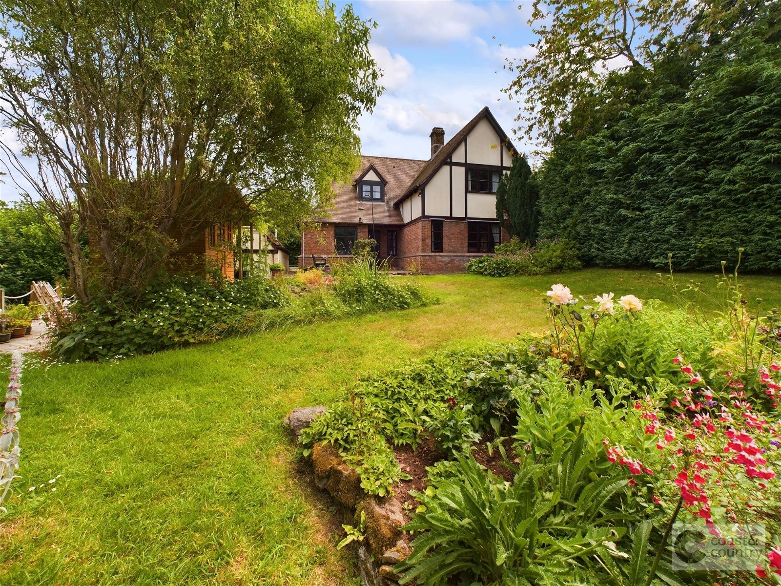 <p>Detached house in a tucked away position with annexe, generous garden and extensive parking.</p>