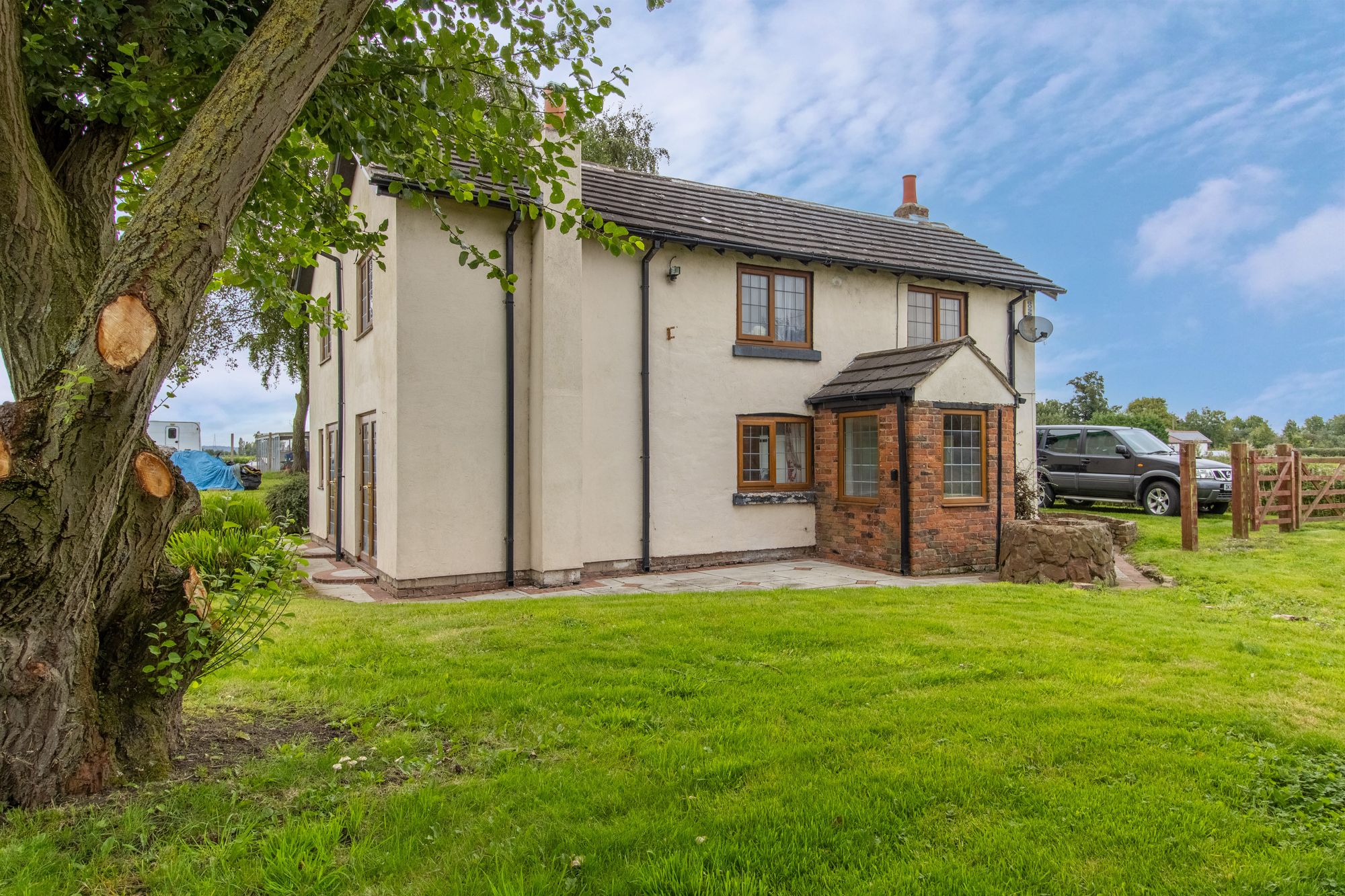 Introducing Middlefield Farm Cottage - a charming historic cottage dating back to the 1800’s nestled in this incredible plot on Potters Lane. Surrounding this picturesque cottage are generous gardens that offer unobstructed 360-degree views of the breathtaking fields and countryside.