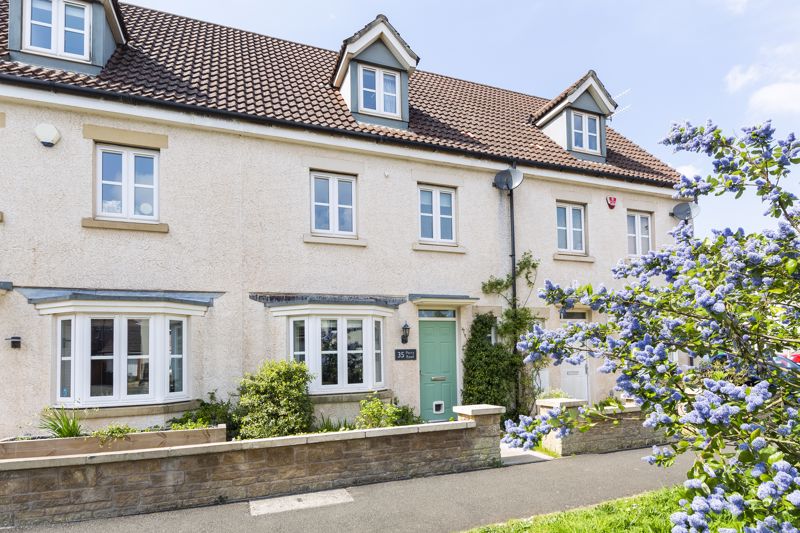 *** NO CHAIN A  *** deceptively spacious four-bedroom, three-storey townhouse enjoying a south-west facing garden, single garage and driveway