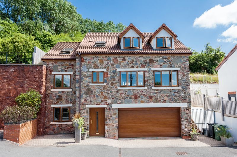 A unique modern home, built in 2011, offering spacious and versatile accommodation (2,644sq ft) enjoying superb views, whilst backing on to local woodland
