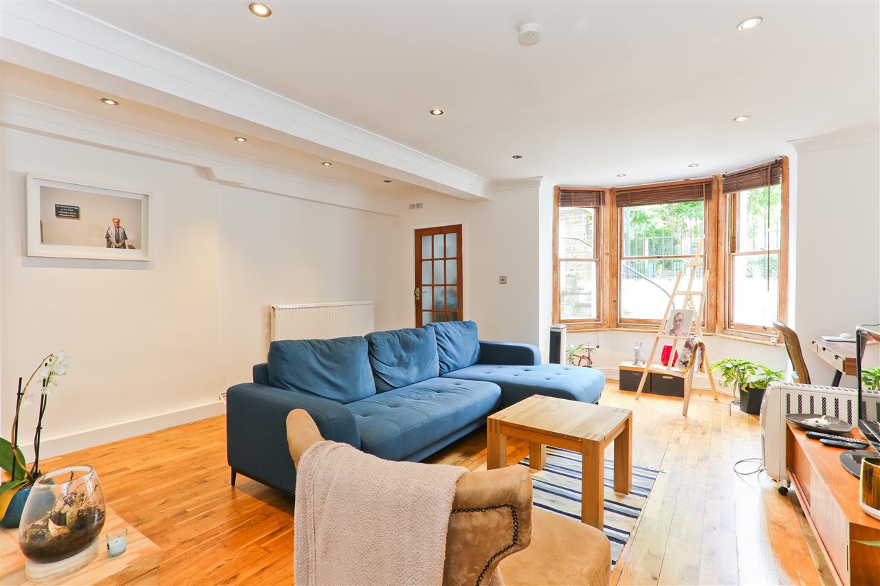CHAIN FREE! A spacious lower ground floor garden apartment forming part of an imposing end of terrace Victorian property situated in a highly sought after location within close proximity to the multiple shopping and transport facilities surrounding and including both Kentish Town (Northern Line ...