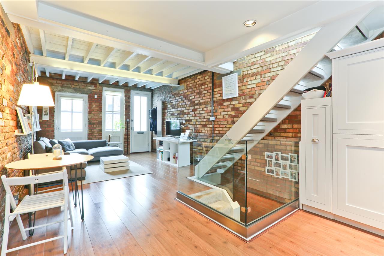 CHAIN FREE! An immaculately presented terraced house situated within a highly sought after gated Victorian cobbled mews. The accommodation seamlessly blends character and charm with contemporary living to include: three bedrooms and bathroom on the ground floor, stunning open plan reception ...