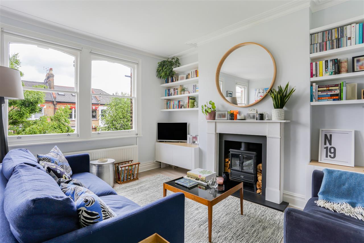 An extremely well presented and spacious (approximately 836 Sq Ft/78 Sq M including restricted head height area and eaves storage) split level apartment occupying the upper floors of a converted Victorian property situated in a prime location in one of the most sought after tree lined roads in ...