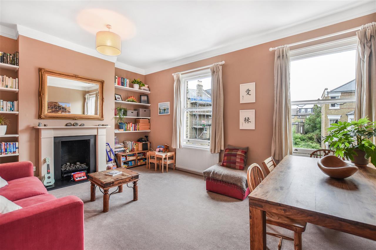 A very spacious (approximately 1305 Sq Ft/121 Sq M including restricted head height areas and eaves storage) and well presented apartment arranged over the upper three floors of a Victorian property situated in a highly sought tree lined road in the heart of Tufnell Park within close proximity ...