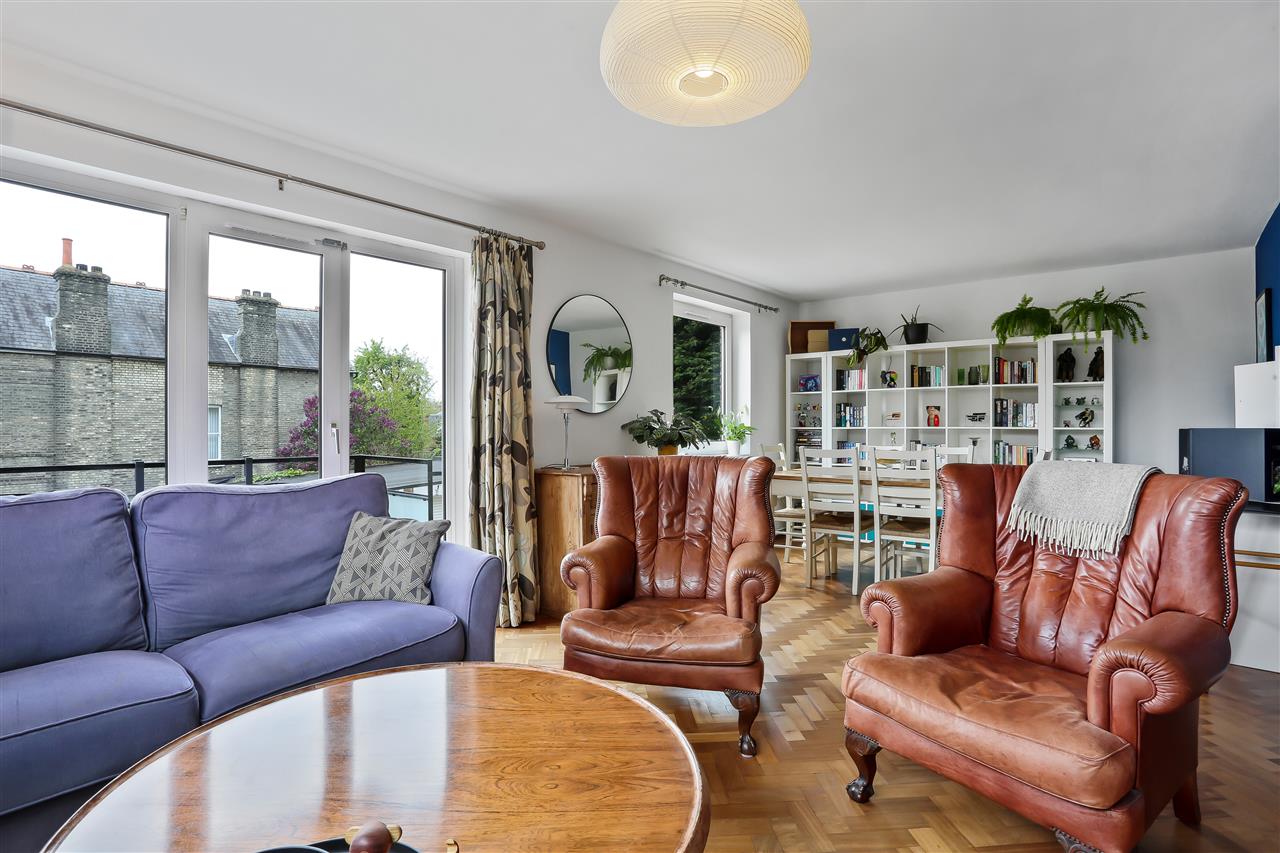 An immaculately presented and spacious raised ground floor flat with garage en bloc forming part of a low rise purpose built block situated in a popular residential location within close proximity to the local shops on Dartmouth Park, Swains Lane, the open spaces of Hampstead Heath,  Tufnell ...