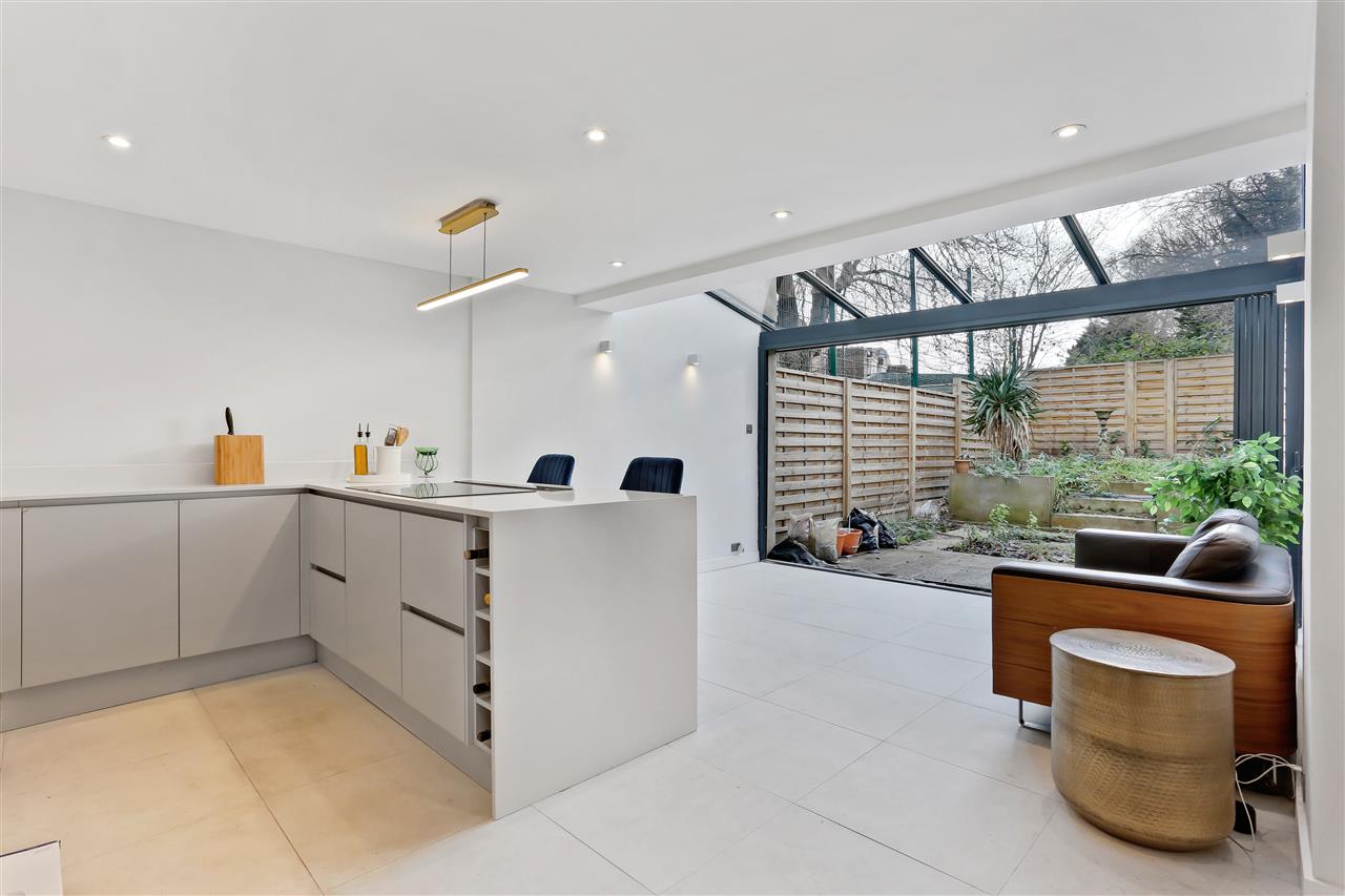 NEW LISTING! A back to brick renovation in a modernist architecturally designed terraced house located on a unique crescent in Tufnell Park. This four bedroom house is situated in a sought-after residential location within close proximity to the multiple shopping, dining and transport ...