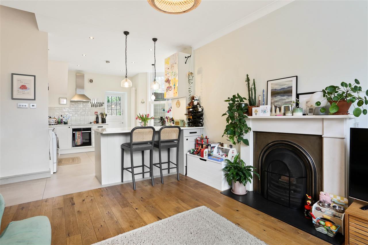 NEW LISTING! A very well presented and spacious (approximately 972 Sq Ft/90 Sq M) split level lower ground and raised ground floor garden apartment forming part of an end of terrace converted Victorian property. The thoughtfully planned accommodation comprises: three double bedrooms (two of ...
