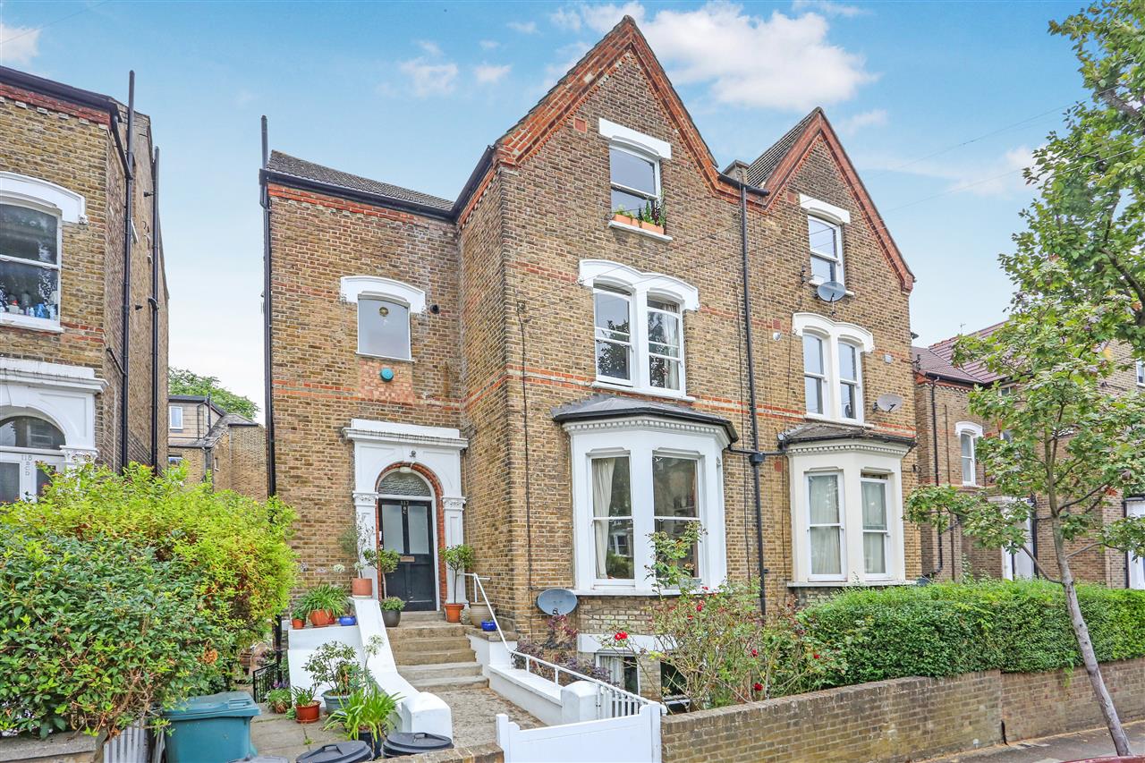 A refurbished to a very high standard and spacious (approximately 840 Sq Ft/78 Sq M including restricted head height areas) split level top floor garden apartment forming part of an imposing converted Victorian semi detached property situated in a highly sought after road in the heart of ...