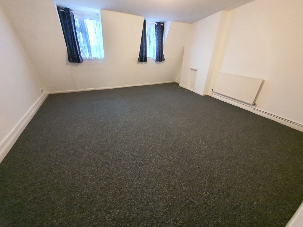 Large, top floor flat. The flat consists of a meandering hallway, large lounge with a separate kitchen. The kitchen is fitted with new appliances. There is one good sized bedroom and a modern bathroom. Available now.  This flat is ONLY available to a MAXIMUM of 2 tenants, due to HMO laws.