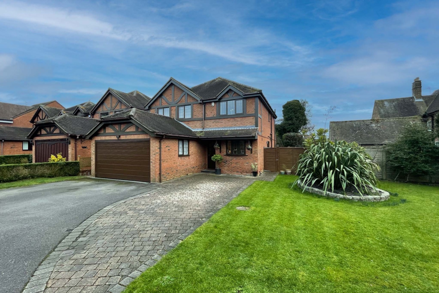 **CHECK OUT THE PROPERTY VIDEO** A stunning family home on a private road in the village of Holmer Green.  Internally the home is beautifully presented and offers a downstairs cloakroom, study, kitchen, separate utility room and a  huge open plan living area to the rear.
