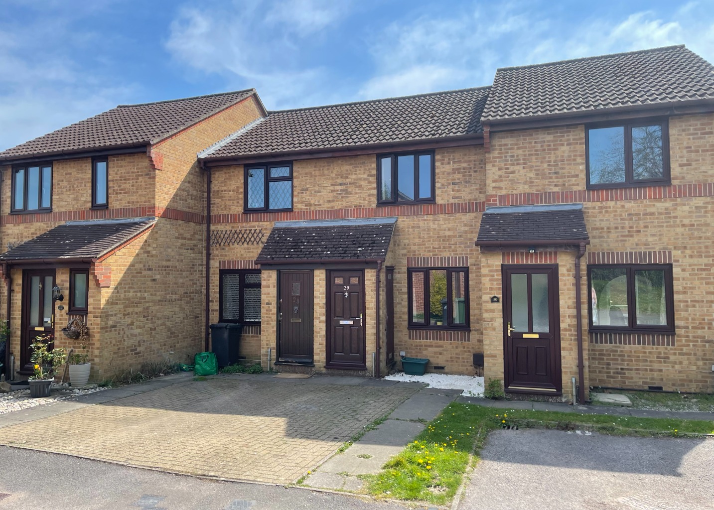 A well presented two bedroom home with driveway parking directly outside. Internally has a welcome hall opening through to the living room with a staircase that leads up to two bedrooms, and a modern bathroom. Bedroom one has a in built cupboard as well as a fitted wardrobe and cabinet suite.