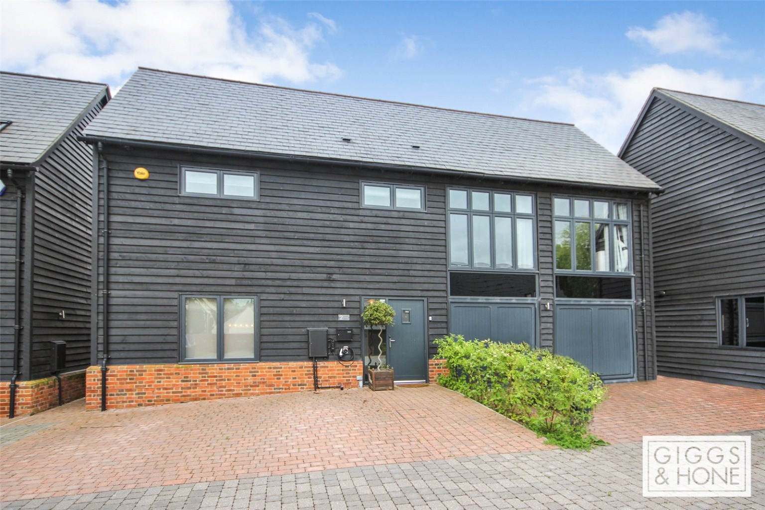 Located within a private courtyard of just five homes and accessed via electric gates, this truly stunning barn conversion which was constructed by Revolution Homes in 2018 benefits from two parking spaces and fitted to a high specification throughout.