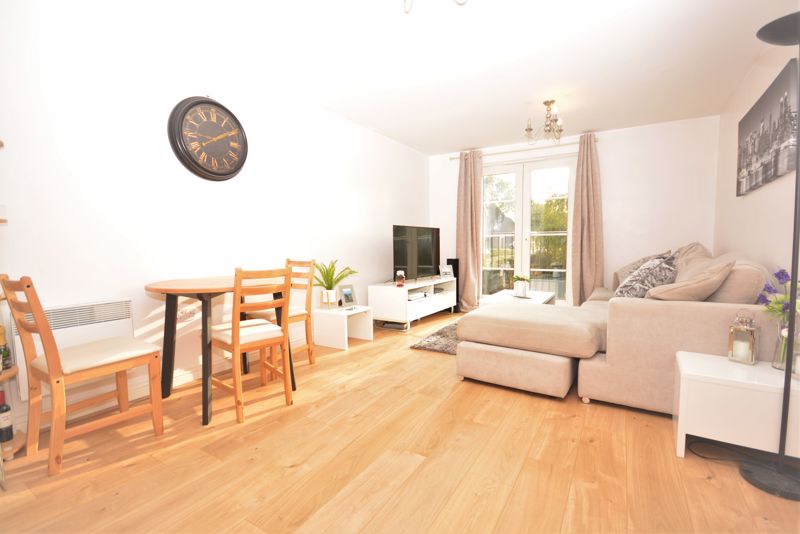 <br/><br/>*Available Mid-July*<br/><br/></span>A beautifully presented two bedroom flat in the desirable area of Rainham.<br/><br/>With good links to the train station and motorway, yet tucked away enough to allow for privacy and quiet; this property is an ideal place to make home.<br/><br/>There is also off road parking for one car and 3 visitor spaces.<br/><br/>As you enter this first floor flat you are greeted by a neutrally decorated hallway with wooden flooring. Directly in front of you is the well maintained family bathroom which benefits from a tasteful white suite and shower over the bath.<br/><br/>To your left are the two bedrooms. One of which is a large double with modern decor and an en-suite shower room and toilet.<br/><br/>The second bedroom is a good sized single bedroom which could also be used as a study or dressing room.<br/><br/>Walking in to the heart of the property you are greeted by a bright open plan living space. With a large living/diner benefiting from a Juliet style balcony to open up the room and allowing for plenty of light to enter. On the other side you have the kitchen which has a built in fridge/freezer, washing machine and dishwasher for your convenience. <br/><br/>Book your viewing now to avoid disappointment as this property won't be on the market for long!<br/><br/>Unfurnished<br/><br/>Available Mid-July!<br/><br/>EPC Rating: C<br/><br/>Council Tax Band B<br/><br/>