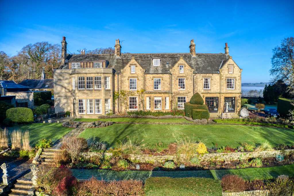 A luxury three bedroom apartment located within a magnificent Grade II listed country house, with double garage and extensive communal gardens including a tennis court. The property is tucked away in a peaceful area on the outskirts of Hexham.