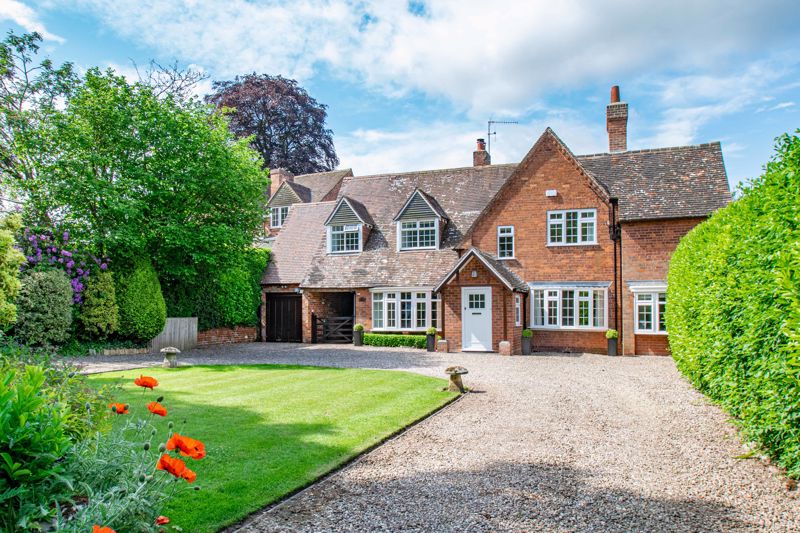 A truly exceptional example, of a substantial detached family home, featuring generous open plan family living, detached annexe, and extensive formal gardens, all situated off a private road in a highly desirable and sought after location of Burcot village, Bromsgrove.<br/><br/>The internal accommodation is accessed via a sizable entrance porch leading through to a bright and airy entrance hall, presenting a feature staircase rising to the first floor landing, and opening into a beautifully presented dining room to front aspect. From the entrance hall, doors radiate off to a stunning and sizable lounge with feature fireplace, dual aspect views and double glazed french doors out to the rear garden, a stylish open plan kitchen/breakfast room complete with an characterful feature log burner, range of fitted wall and base units, skylight, integrated five ring gas hob, double oven, dishwasher and inset sink, while a separate utility room presents space for additional appliances, access to a guest W/C and door out to the rear gardens. From the dining room a good-sized office/snug room is situated to the front of the property, completing the ground floor layout.<br/><br/>Moving upstairs the first floor landing establishes a sizable master bedroom which includes integrated wardrobe storage, access to a large four piece en-suite bathroom and walk in wardrobe; three further well-proportioned double bedrooms and a modern styled family bathroom complete with bathtub and separate shower cubicle.<br/><br/>The property also encompasses a well-presented detached annexe , which presents fantastic opportunity to convert into a  self contained accommodation or office space. The current annexe interior is laid as follows; lounge with spiral staircase rising upto a generous games room/office space having large storage area; and a modern ground floor shower room. <br/><br/>Outside, the residence sits on beautifully landscaped and extensive formal gardens, presenting well-maintained lawns, surrounded by well stocked and mature planted borders, shaped hedgerows, natural pond and large paved patio seating area. The enviable frontage of the property is approached via a private road, large through driveway with central lawn flanked by mature hedgerows adding to the privacy if the plot, access through to the detached garage and side access to the rear of the property.<br/><br/>Additional benefits include gas central heating and double glazing throughout, underfloor heating throughout the entrance porch and en-uite to master, separate boiler to service the annex and brick built garden stores with fitted electrical sockets.<br/><br/>Located in the desirable area of Burcot village conveniently positioned for ease of access to the M42 and M5 motorway links and well-regarded schooling. The property also offers nearby village of Blackwell offering golf course and Barnt Green offering further shops and amenities along with train station with links into Birmingham City centre.