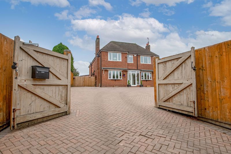 A beautifully presented four-bedroom detached family home, situated in a sought-after area of Halesowen, with a generous rear garden, and a private gated driveway with space for several vehicles.   <br/><br/>In brief, this property comprises; Entrance porch, a first reception room with a feature fireplace, and connecting dining area with lovely views as well as access to the rear garden. A second reception room with a second feature fireplace. A spacious kitchen/breakfast room that provides plenty of worktop space, separate bar area as well as offering space for a; Range cooker, American style fridge freezer, dishwasher. Just off the kitchen is a separate w.c, as well as a laundry room with further worktop space, sink with drainer, and space for; A fridge freezer, washing machine, tumble dryer, and dishwasher.  <br/><br/>The first floor lends itself to four bedrooms; A master boasting an en-suite providing a walk-in shower, washbasin, and w.c. A second double bedroom with fitted wardrobes, a third double bedroom with fitted storage, and a fourth bedroom with space for a double bed and wardrobes. The family bathroom benefits from having a large walk-in shower unit and freestanding bath, and a third bathroom offers: A shower unit, w.c, and washbasin.  <br/><br/>A mainly laid to lawn rear garden provides the perfect outdoor entertaining space with two separate alfresco dining areas, planting borders, and attractive trees and shrubbery. Additionally, the rear garden also benefits from having a sizeable outdoor structure that has been turned into a bar and lounging area. Side access leads to the front of the property where sits a spacious gated driveway with plenty of space for several vehicles.   <br/><br/>Situated in an ideal location this property benefits from having nearby local shops, eateries, and other amenities, as well as being in the catchment area for highly regarded schools. For commuters, this property is ideally situated close to road links leading on to Birmingham, Halesowen Town Centre, and Stourbridge giving access to local shops and amenities, as well as having road links to the M5.