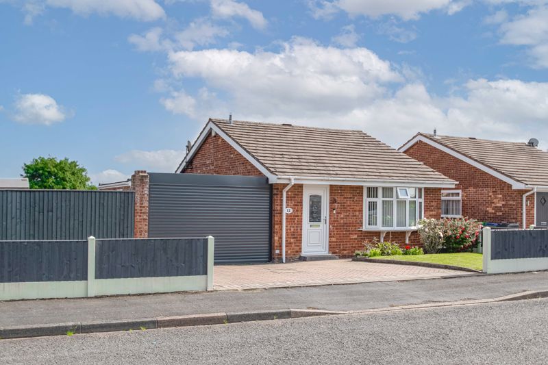 A beautifully presented two-bedroom link detached bungalow with a generous wrap-around rear garden, plenty of off-road parking, and a master bedroom with en-suite. <br/><br/>In brief, this property comprises; A well-fitted, modern kitchen with an abundance of integrated appliances such as; Five ring gas burner stove, oven, dishwasher, washing machine, fridge freezer, and extractor fan. A spacious lounge/diner with a feature fireplace, and bay window. A lovely master bedroom with fitted wardrobes, double doors onto a rear decking area, as well as boasting its own en-suite with bath unit. <br/><br/>Passing back through the lounge and onto a side hallway leads to family bathroom with a walk-in shower unit and built-in storage, as well as a second good-size bedroom with its own dressing area and double doors onto the front court yard. <br/><br/>Externally this property has a generously sized wrap around and easily maintainable garden that is ideal for outdoor entertaining and alfresco dining. An initial courtyard entered onto from the kitchen is also accessible via electric shutter at the front of the property, which also provides secure off-road parking. Leading around the back of the property is a lovely decked area and further outdoor entertaining area and beyond this is a mainly laid pebbled area. <br/><br/>This property is ideally located for local shops and amenities, including Rowley Golf Course, a doctor's surgery, and a pharmacy. There are road links to junction 2 of the M5 for access to Birmingham and Bromsgrove. Rowley Regis train station is also close, providing public rail links to Birmingham and Worcester. For families, there is local schooling for both primary and secondary ages.