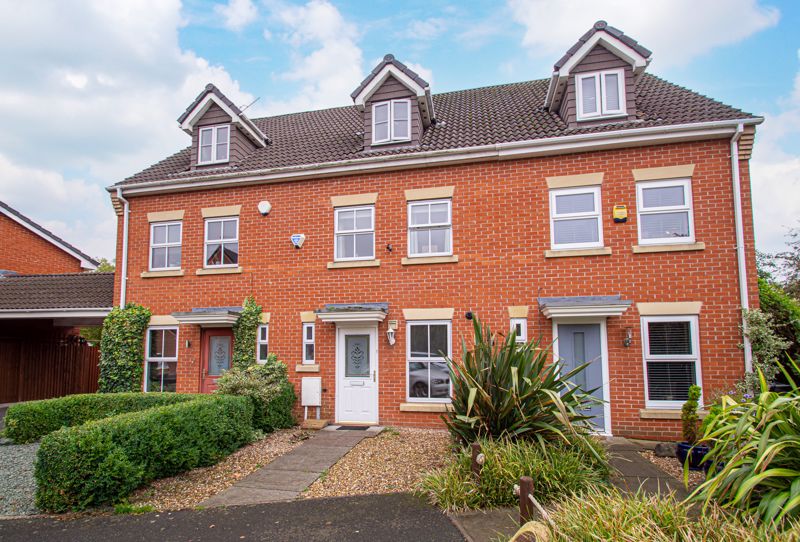 A well-presented three-storey town house, located on a quiet close next to the Dudley Canal, with adjacent tow path for walks. <br/><br/>This property briefly comprises; Entrance hallway with cloaks storage and guest w.c. Fitted breakfast kitchen boasting an inset sink, gas hob, integrated oven, space for additional appliances and breakfast shelf. Well proportioned lounge/diner with a electric fire to surround, oak effect floor and double doors onto the rear patio. <br/><br/>Stairs from the hallway rise to the first floor, which is given over to two spacious double bedrooms with wardrobe space.  The family bathroom sits between which provides a shower over the bath.  <br/><br/>Further stairs rise to the top landing leading onto the master bedroom, having window to front, fitted wardrobe and storage cupboard, a dressing table and an arch opening to a generous dressing room which could make a good private office space. The stunning en-suite has been recently fitted out along a contemporary theme, with storage beneath the sink, black framed screen to to a walk in shower and attractive decorative tiling to floor. <br/><br/>Externally, the front garden is laid for ease of maintenance and benefits from views of the canal. The rear garden is laid out with loose bark beyond the patio, inset with paving slabs leading towards a rear gate for bin access. This then reaches the rear courtyard housing the single garage placed to the middle of a block with parking to front. <br/><br/>Ideally situated in a popular area of Cradley Heath, the property is close to local shops, takeaways, a library and surgery, large supermarkets in Black Heath High Street, plus a good range of schooling. The M5 motorway and Old Hill railway station are both easily reachable for commuting to Birmingham and beyond.   