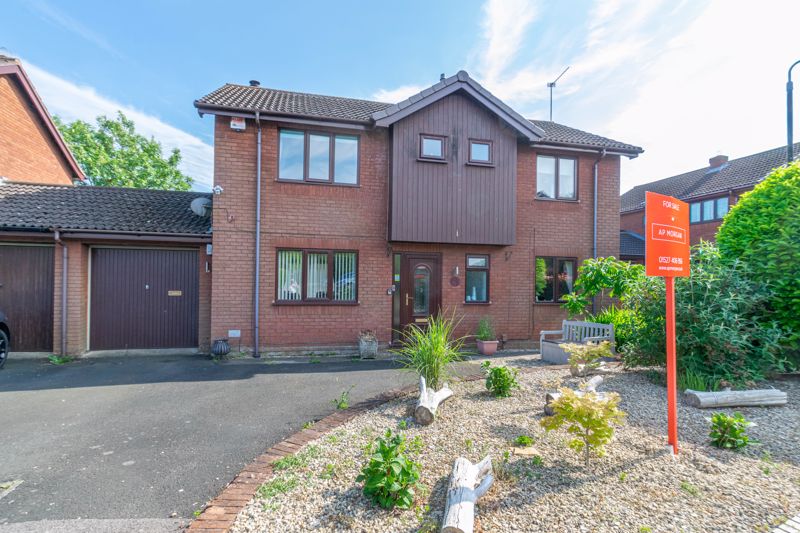 A spacious four bedroom link detached home set within a pleasant cul-de-sac on the fringes of Church Hill North. <br/><br/>The layout briefly comprises: Pleasant entrance hallway giving access to the modern guest w.c and doors to the following rooms. Through living room, boasting a log burner to inglenook fireplace, wall lighting, wooden floor and double doors to the rear garden. Separate dining room to front. Excellent well thought out breakfast kitchen, having striking composite work surfaces with integrated sink, built in oven and microwave, fridge/freezer, plumbing for dishwasher, under cupboard spot lighting and superb breakfast bar, there is also a walk in pantry and pvc door leading to the garden. <br/><br/>The first floor accommodation is given over to four double bedrooms, the master containing a wall of fitted wardrobes and access to its own upgraded en-suite shower room. The family bathroom offers a mixer attachment over the bath, cupboards beneath the sink, deep display shelf and towel radiator. <br/><br/>Outside: The front garden has a driveway for several cars and a single attached garage of ample proportion. Access from the rear reaches the 9ft square utility room, with plumbing for appliances and room for storage. The rear garden has been landscaped with decorative paving, slate infill and raised beds. There is a summer house included as well as a log store. <br/><br/>Other benefits includes gas central heating and double glazing. <br/><br/>Locally shops, a post office and community facilities are reasonably close to the property and bus connections are available running into Redditch town centre. A short drive gains access to Beoley village with small hall and school. The property is on the reachable side of Redditch for the M42 motorway for commuting to surrounding areas.  