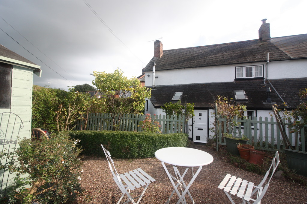 Charming 2/3 bedroomed semi-detached cottage in Alphington. Beautifully presented and with mature gardens on 3 sides and off road parking. Kitchen and living room with wood burners, another large reception room/3rd bedroom/office, 2 double bedrooms upstairs and bathroom. Available Now