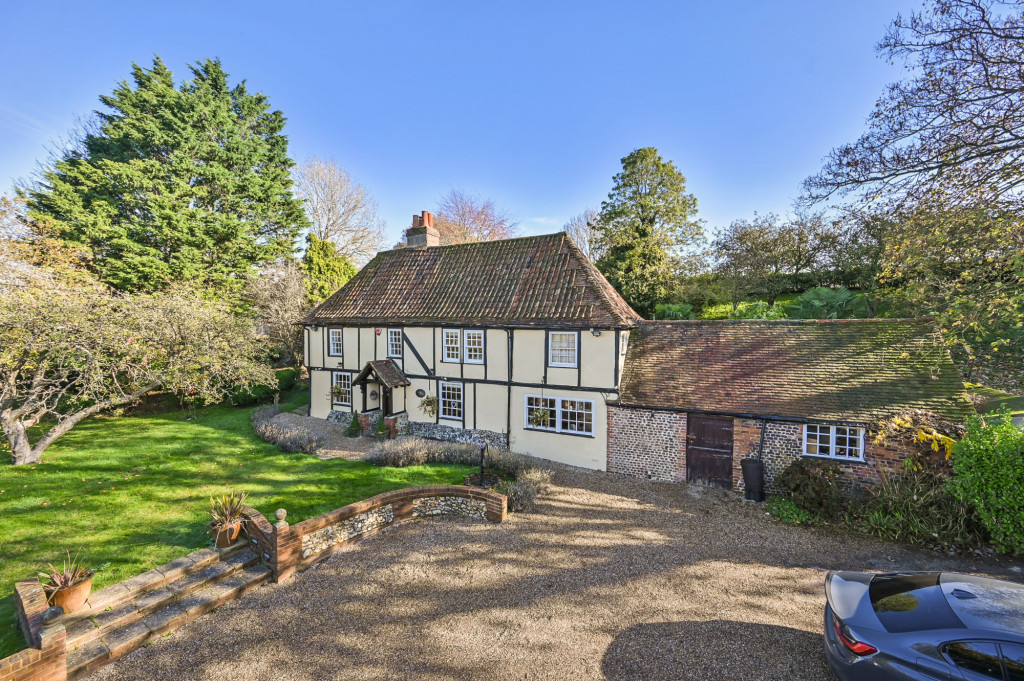 This superb 15th Century Grade II Tudor Farmhouse boasts amazing period features and is set within 7 acres with stables and outbuildings being of equestrian interest. Contact us today!