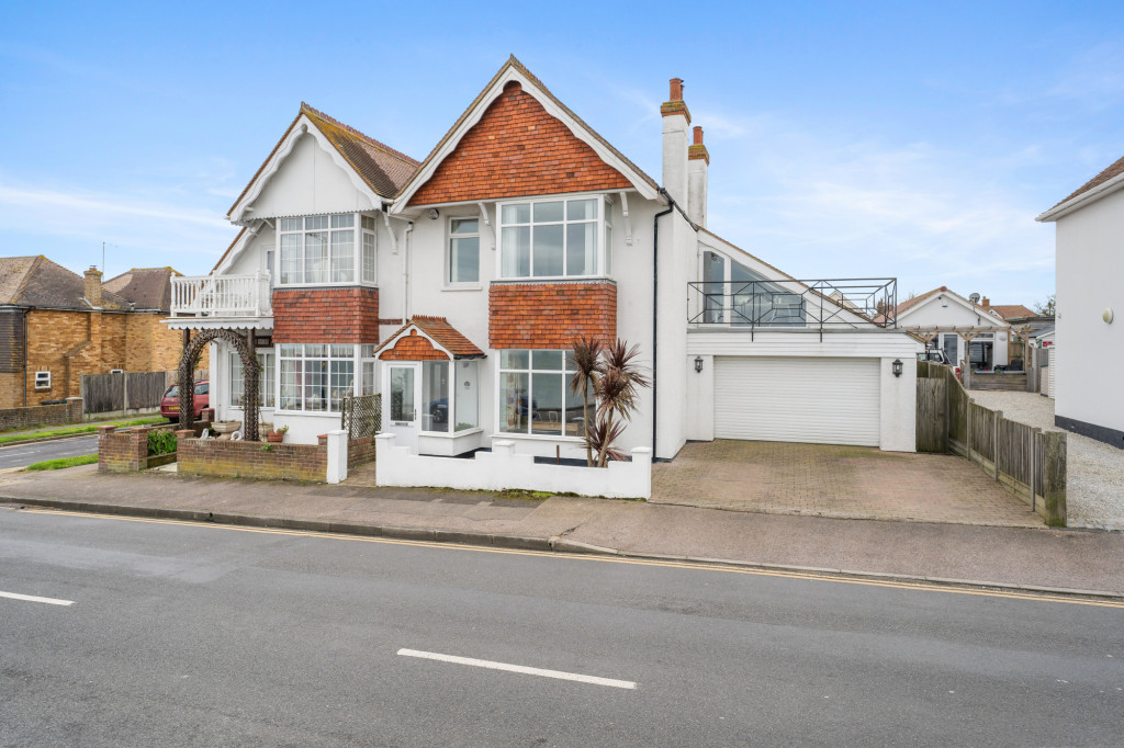Stunning Seafront home with breath taking direct sea views. Light, spacious living space, whilst maintaining many period features. With an established south facing garden and entertainment space, a large garage and off road parking.